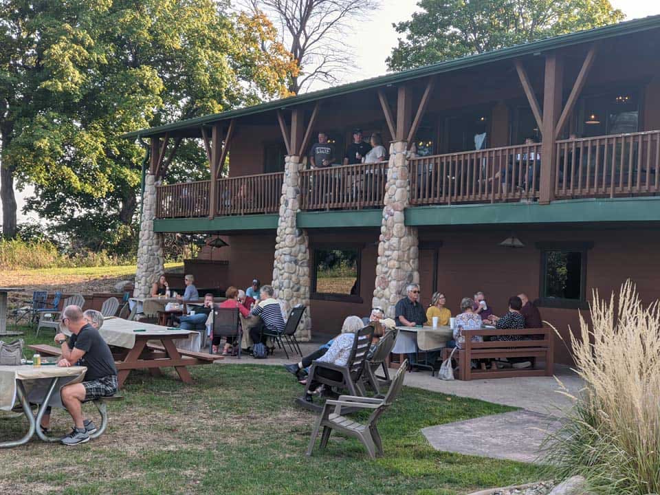 Guests relaxing on the lodge patio
