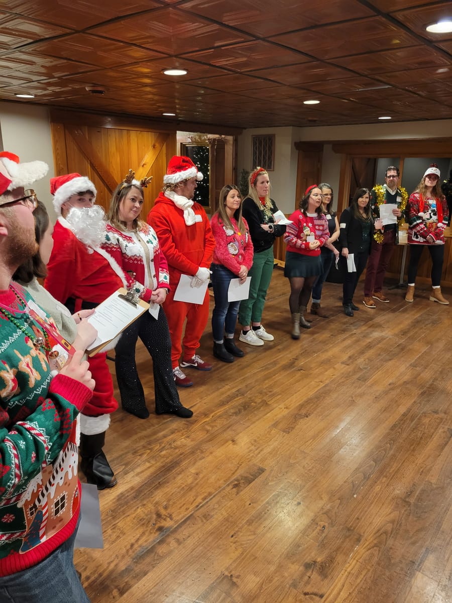 Guests dressed up for a holiday party at the Good Shot lodge